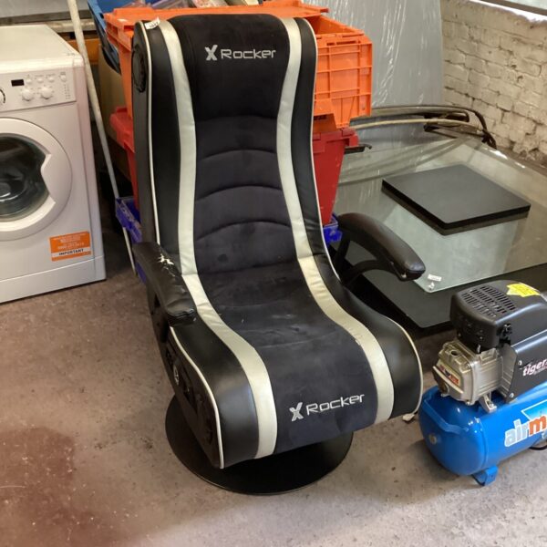 Black X Rocker gaming chair for comfortable video game sessions.