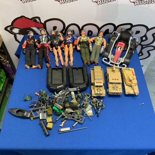 Vintage Action Man figures and vehicles in a collectible lot.