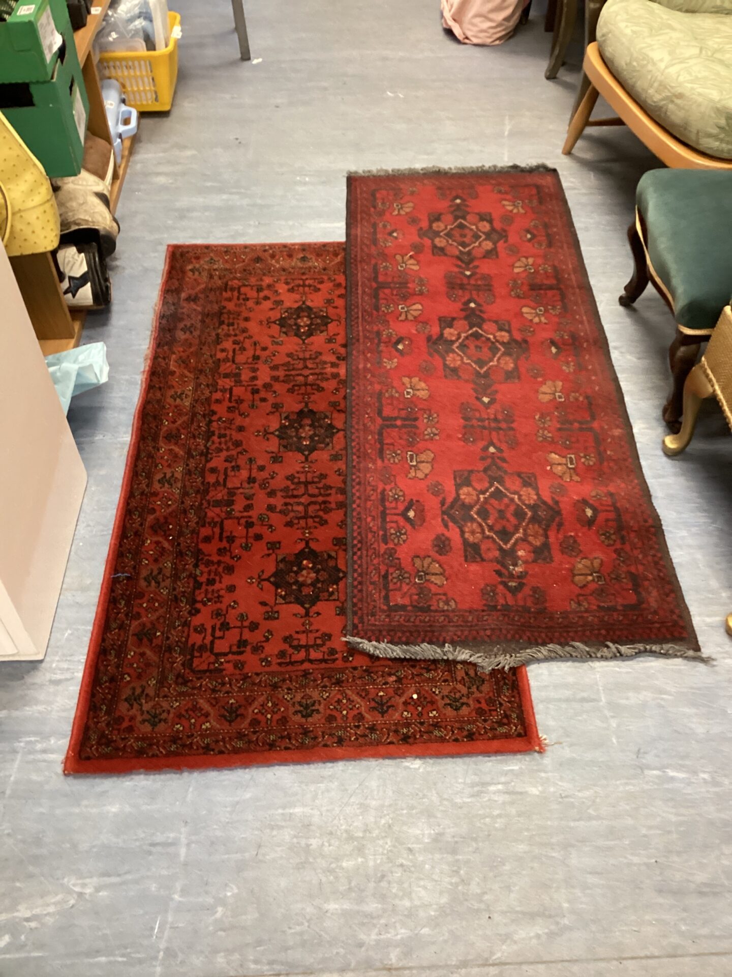 550 Two red runner rugs