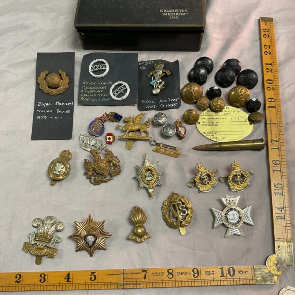 Vintage British military cap badges and buttons lot, WWII era insignia.