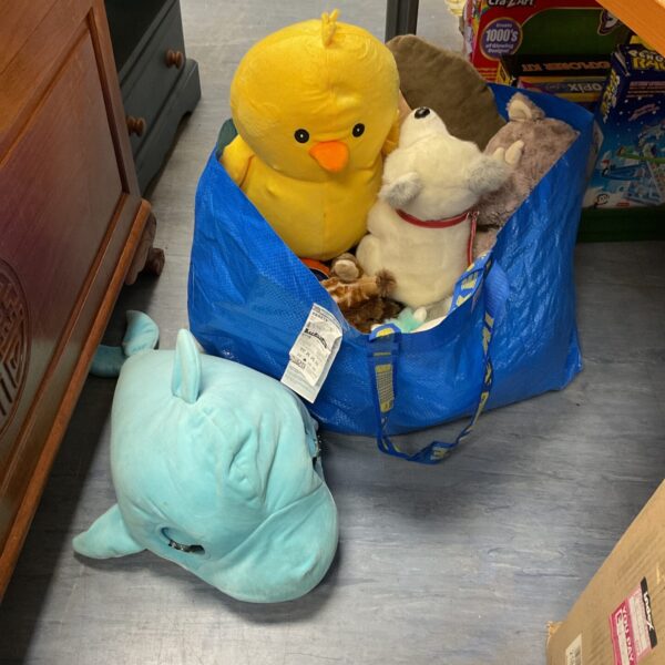 Large bundle of soft toys including a yellow chick.