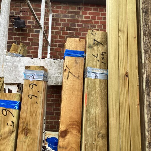 Outdoor timber bundles ready for construction or DIY projects.