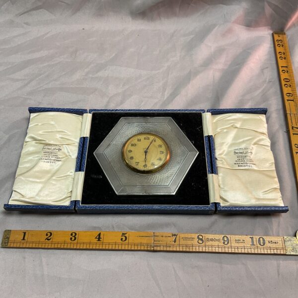 Vintage silver hexagon desk clock in original blue case.