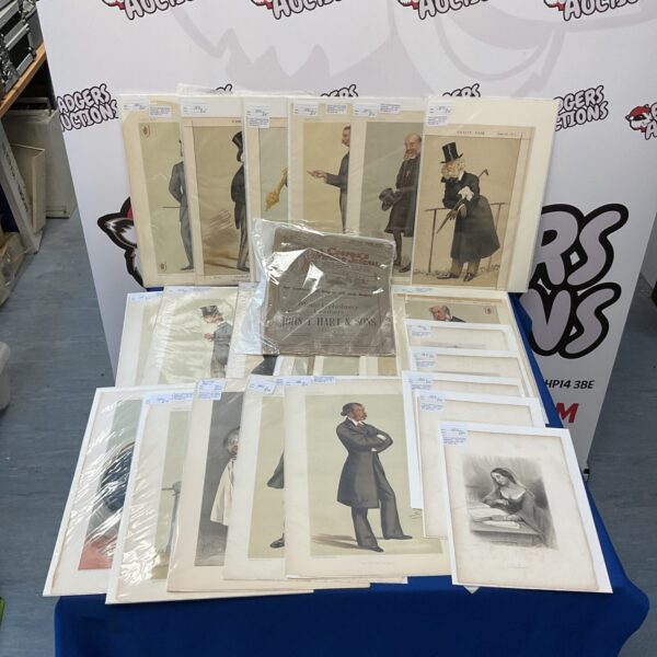 Large collection of antique Victorian engravings and prints on display.