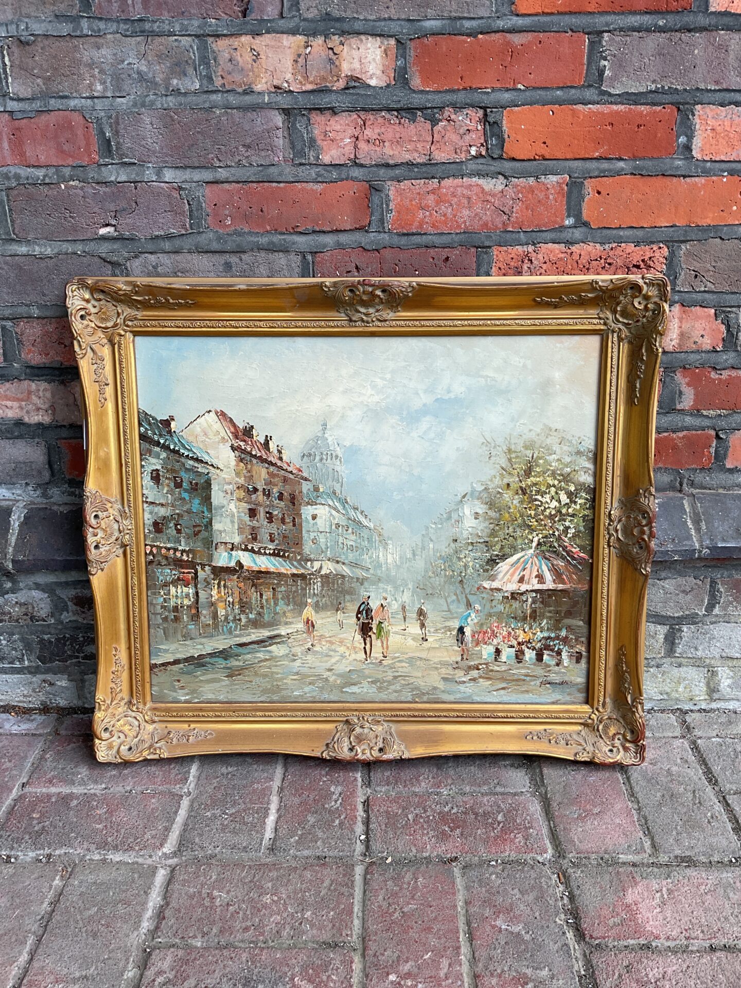 009 Brunette signed gilt framed oil painting of a french street scene