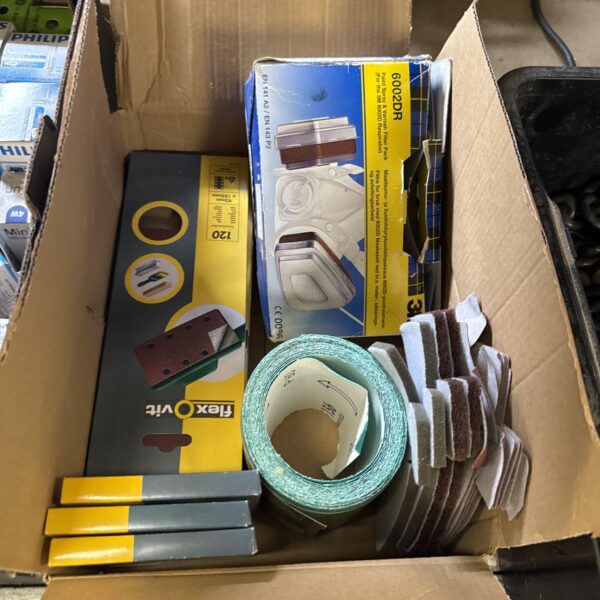 Selection of sanding pads and a 602DR dust mask for DIY projects.