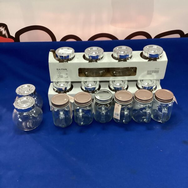 Vintage Rajtan lidded jars and mini mason jars for kitchen storage.