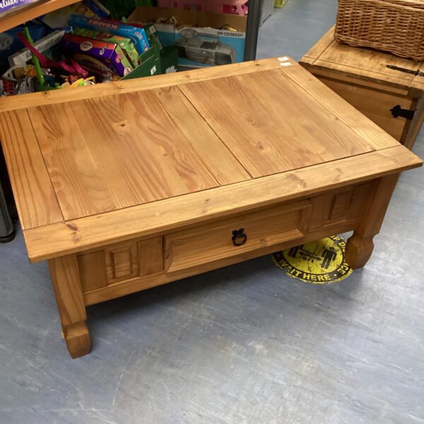 Large pine coffee table with drawer, rustic farmhouse style.