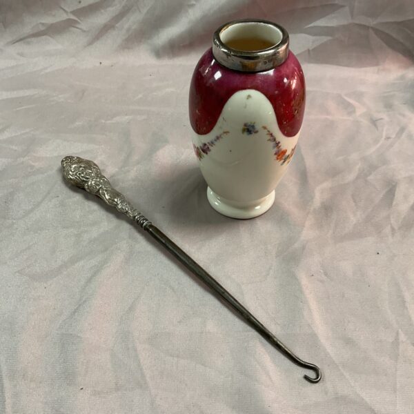 Antique silver mounted vase and hallmarked silver bootlace hook.