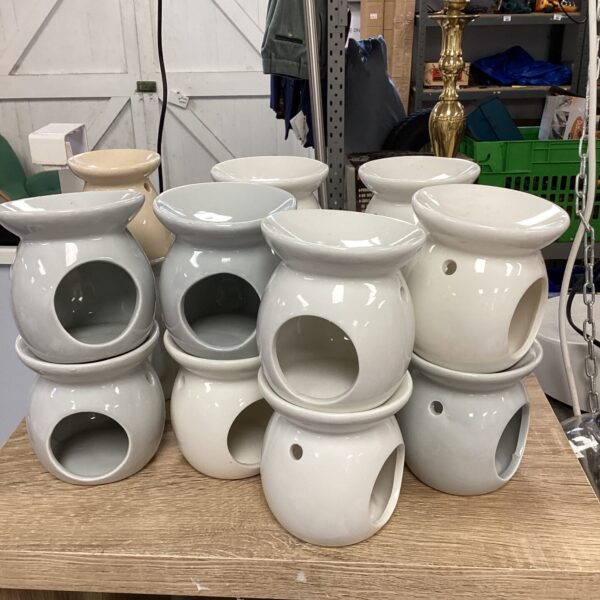 Lot of fourteen ceramic oil burners for home fragrance.