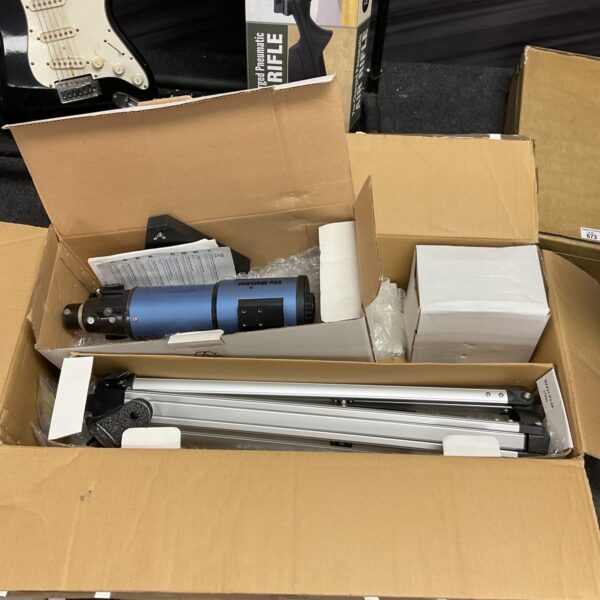 Used Skywatcher telescope set with tripod and motorized head for astronomy.