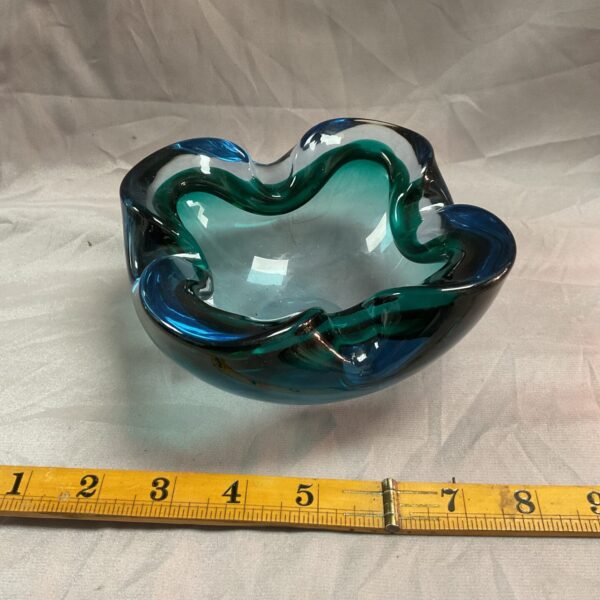 Vintage blue Murano glass bowl with organic seashell shape.
