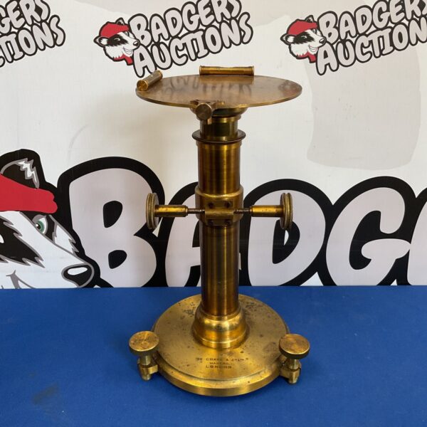 Antique brass balance scales stand by De Grave & Co Limited.