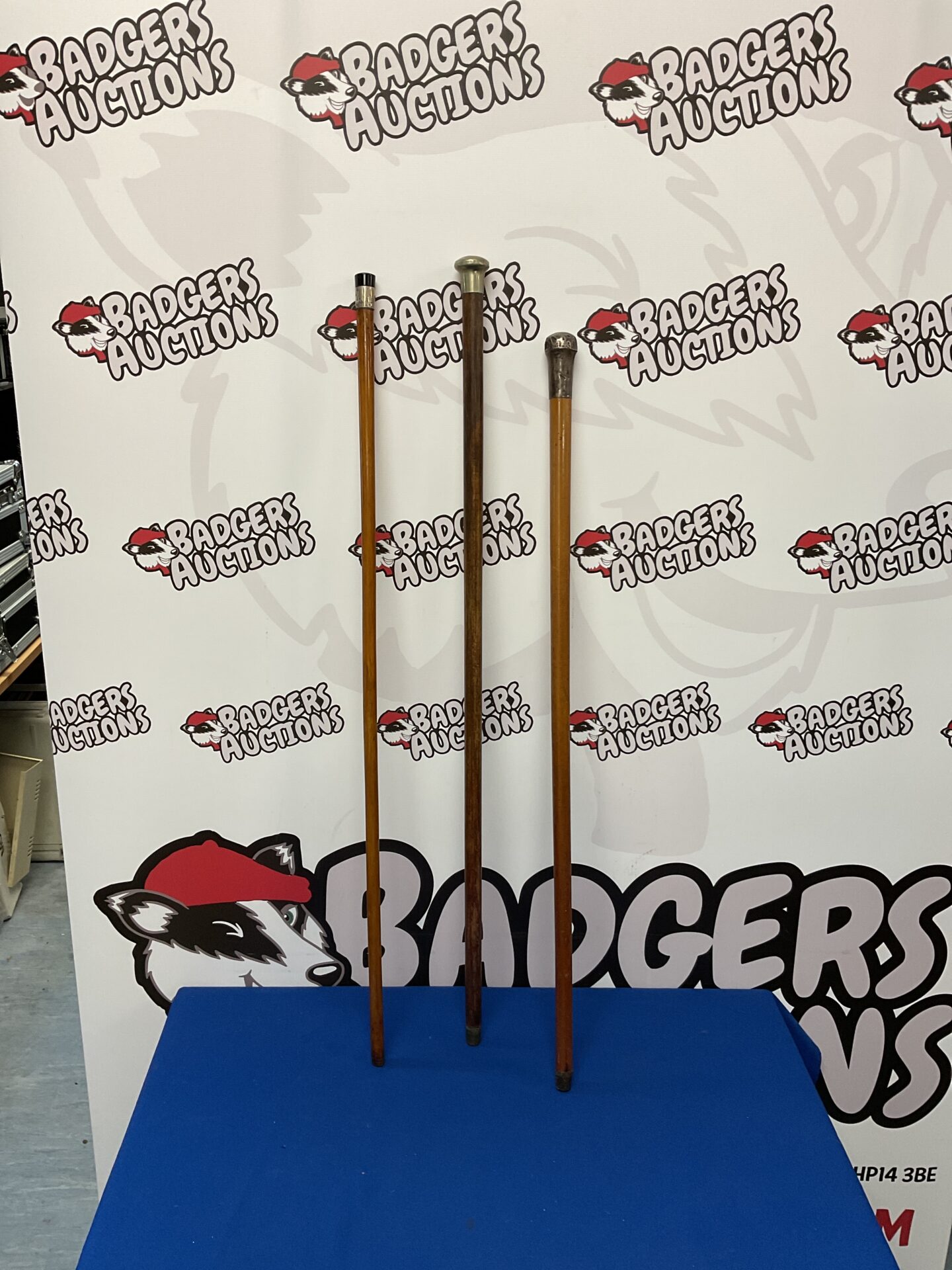 686 Three vintage walking sticks with silver knops