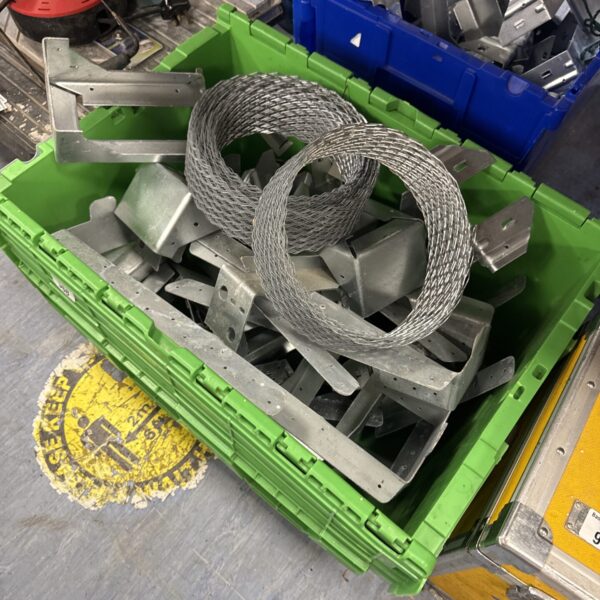 Mixed lot of joist hangers and metal construction hardware.