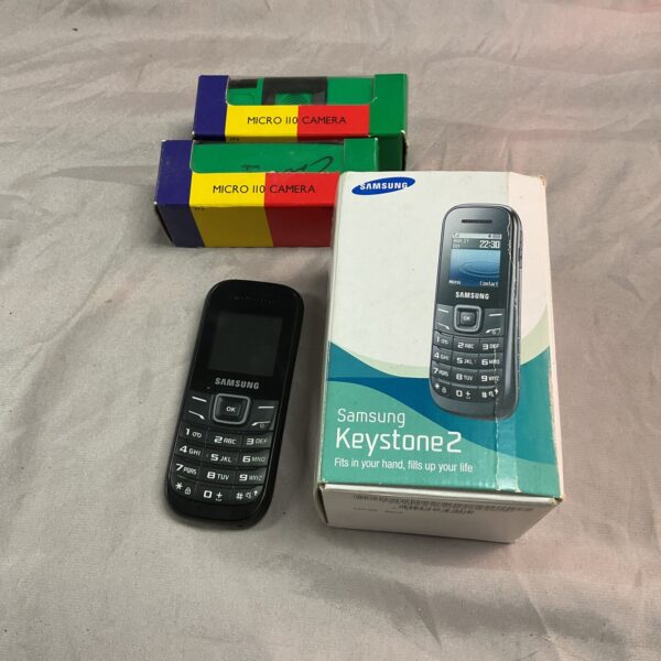 Vintage Samsung Keystone 2 mobile phone with two micro cameras.