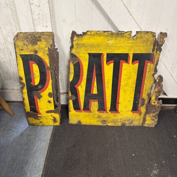 Vintage Pratts enamel sign with bold red lettering.