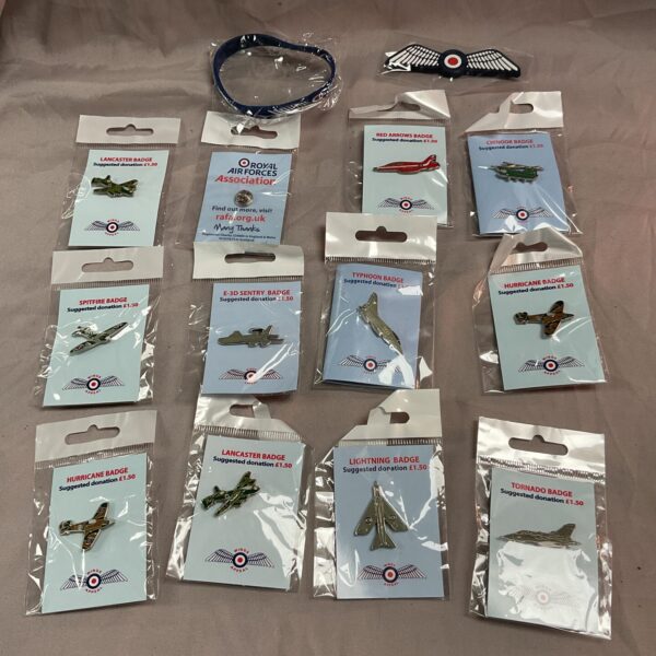 Collection of Royal Air Force charity pin badges for collectors.