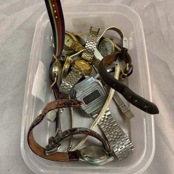 Tray of assorted vintage and broken wristwatches for repair.