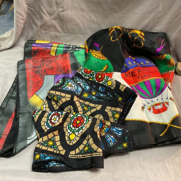 Vintage Hermes silk scarves featuring Picasso and Yorkminster designs.