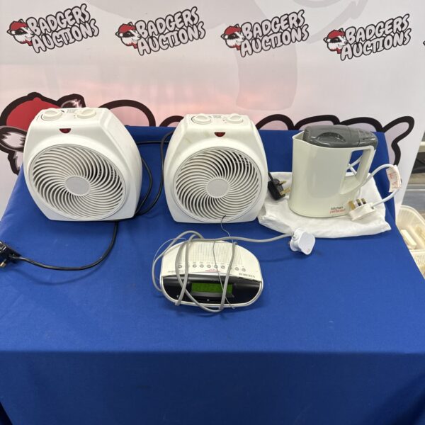Lot of fan heaters, Roberts radio, and travel kettle for sale.