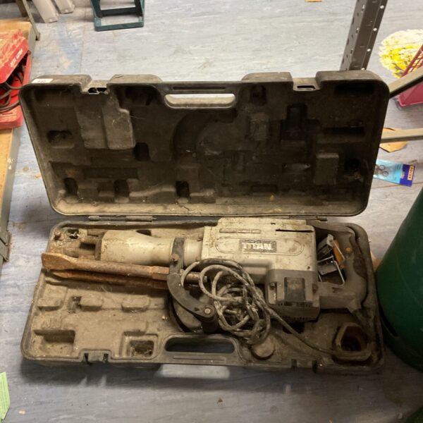 Heavy duty titan breaker demolition hammer for construction work.
