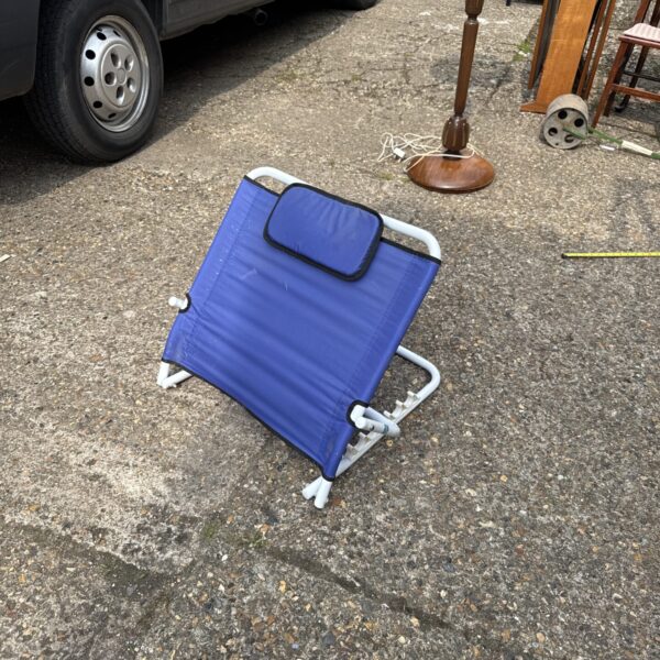 Blue Sidhil folding backrest for beach or garden use.
