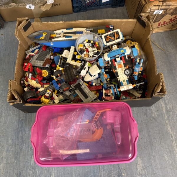 Large mixed Lego lot with boxes of bricks and pieces.