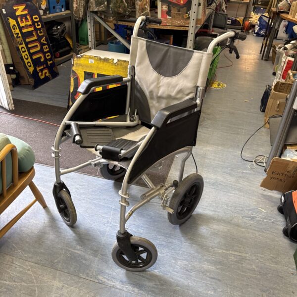 Used Drive wheelchair with foot supports, showing signs of wear.