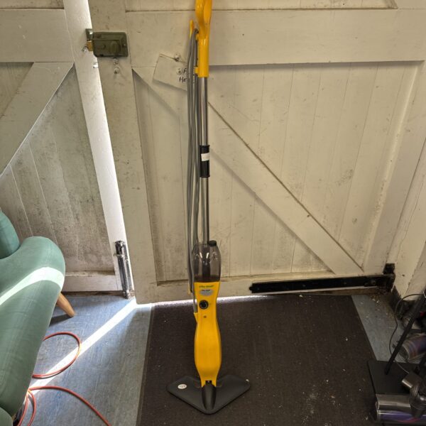 Yellow Efbe-Schott steam cleaner for floor cleaning.