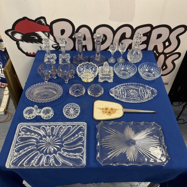 Vintage cut glassware collection with a dressing table mirror.