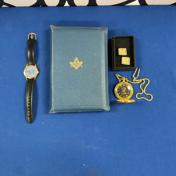 Mixed masonic lot including watch, pocket watch, bible and cufflinks.