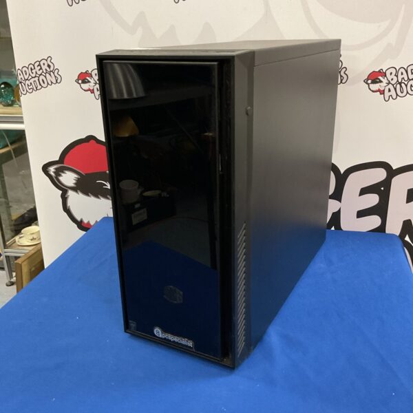 Black Pcspecialist gaming PC tower with blue illumination.