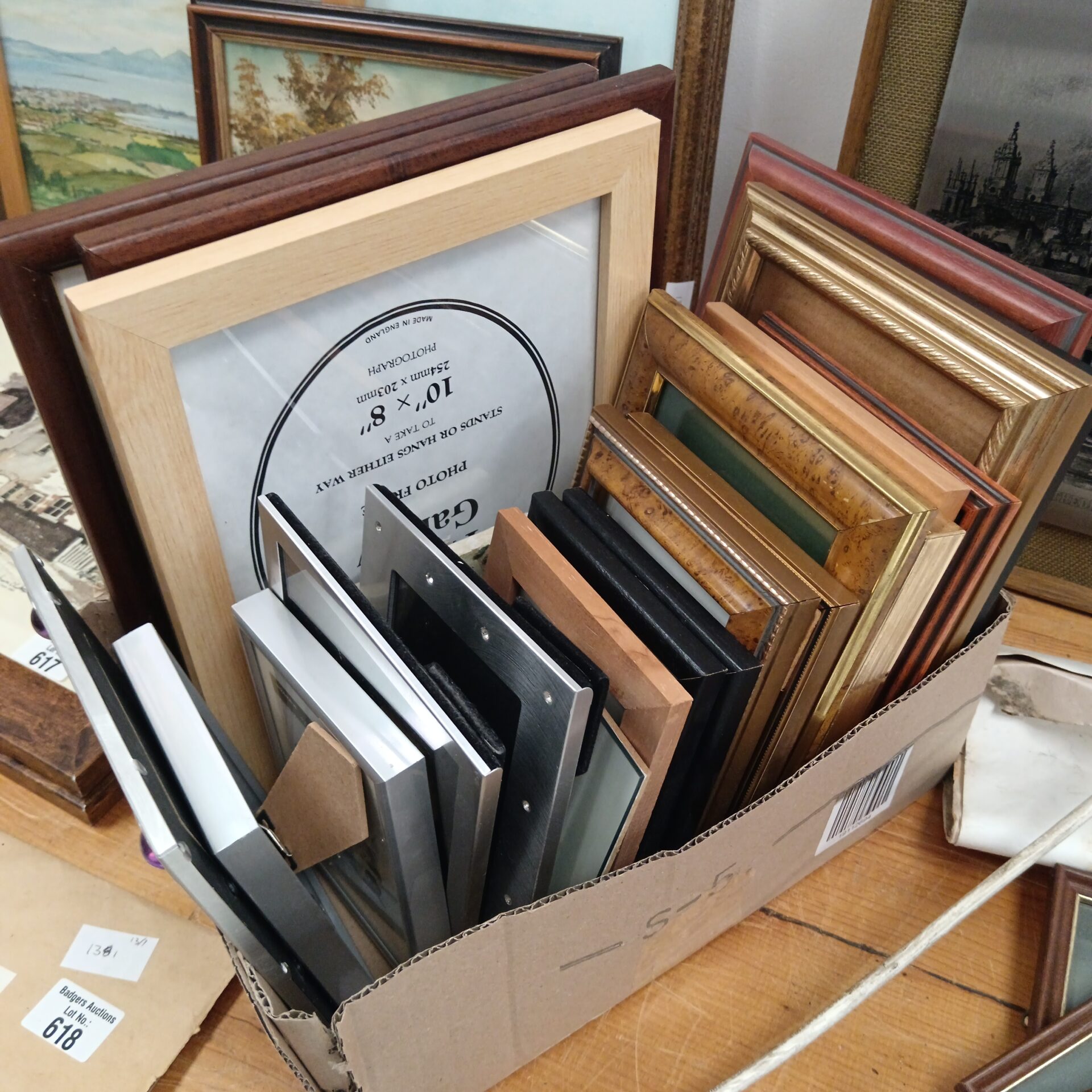 613 Box of small empty photo frames
