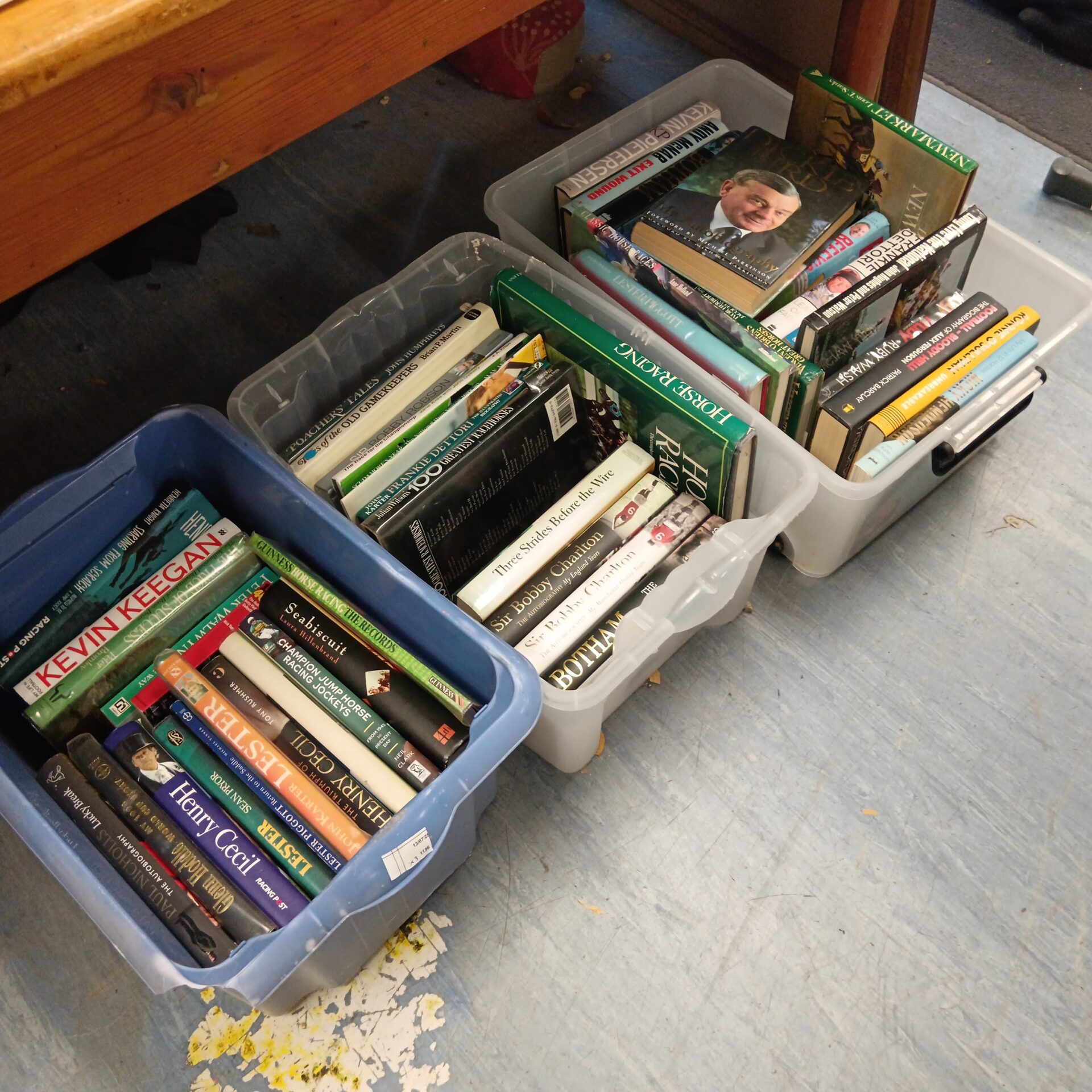 606 Three boxes of sport related books, mainly horse racing