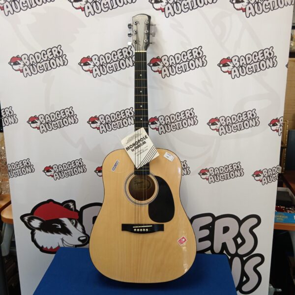 Front view of a natural finish Squire acoustic guitar.