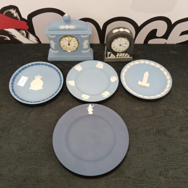 Antique Wedgwood Jasperware clock with blue ground and neoclassical figures.
