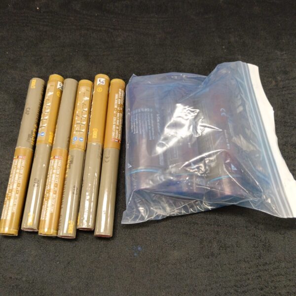 Lot of airsoft smoke grenades and flash bangs for tactical simulation.