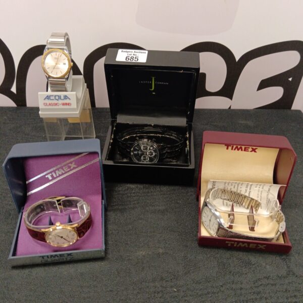 Boxed watch lot featuring Timex and Acqua vintage wristwatches.