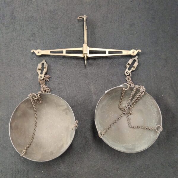 Antique brass Parnell & Sons balance scales with circular pans.