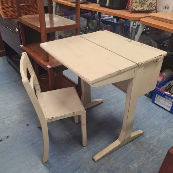 Vintage wooden school desk and chair set, classic classroom furniture.