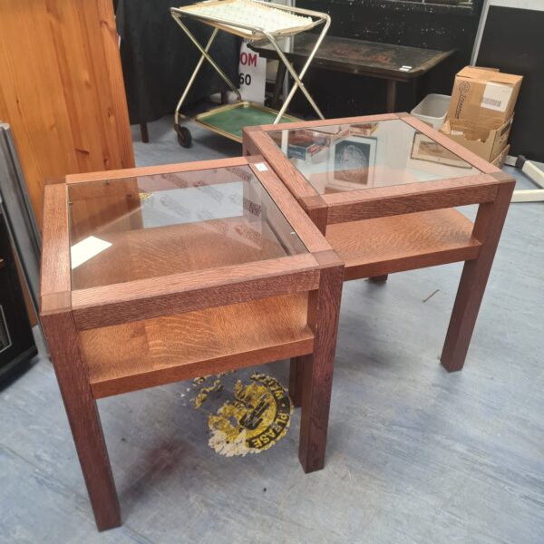 Pair of vintage oak coffee tables with glass tops.