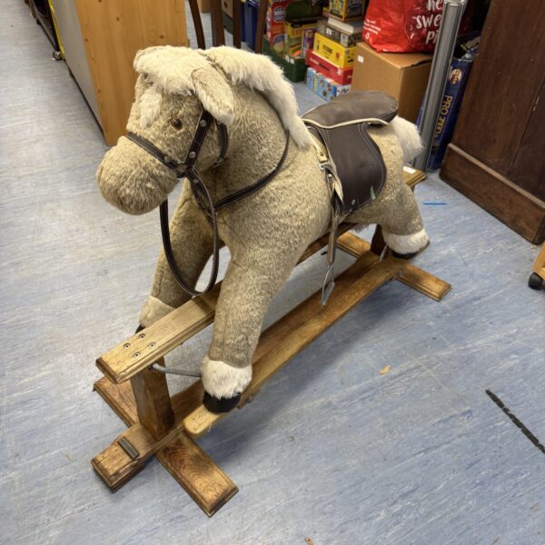 Vintage Mamas & Papas rocking horse in good condition.