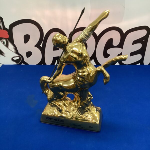 Antique bronze sculpture of a dynamic figure, vintage collectible art.