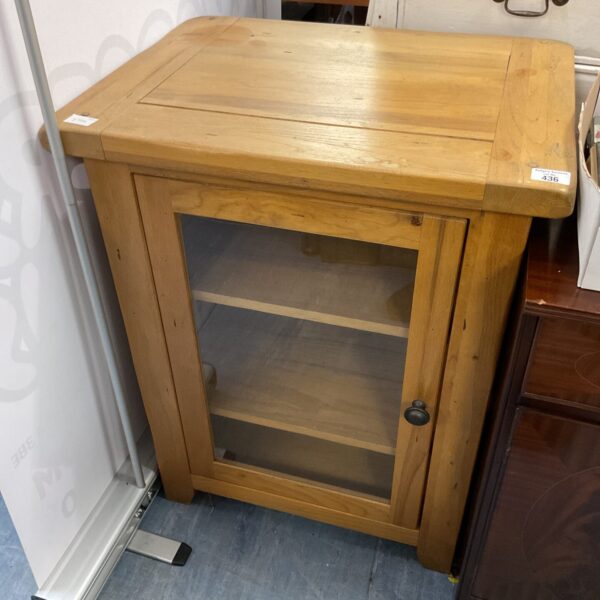 Antique gilt chest of drawers with decorative detailing.