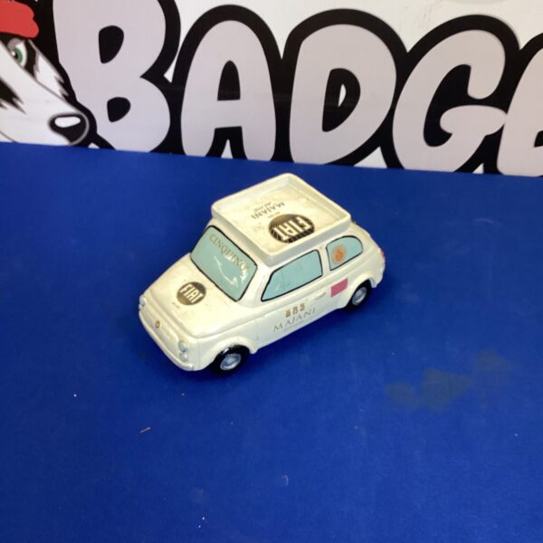 Vintage Fiat 500 car ornament, classic Italian automotive collectible.
