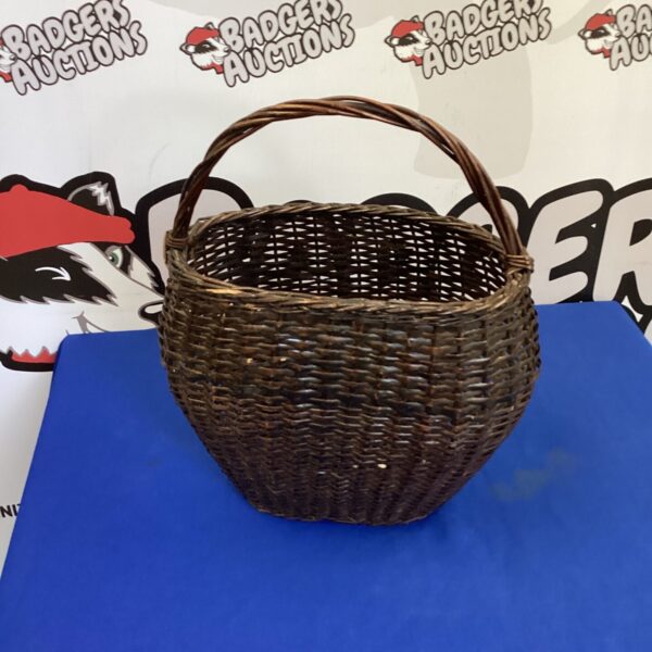 Close-up of a vintage wicker basket with woven texture.