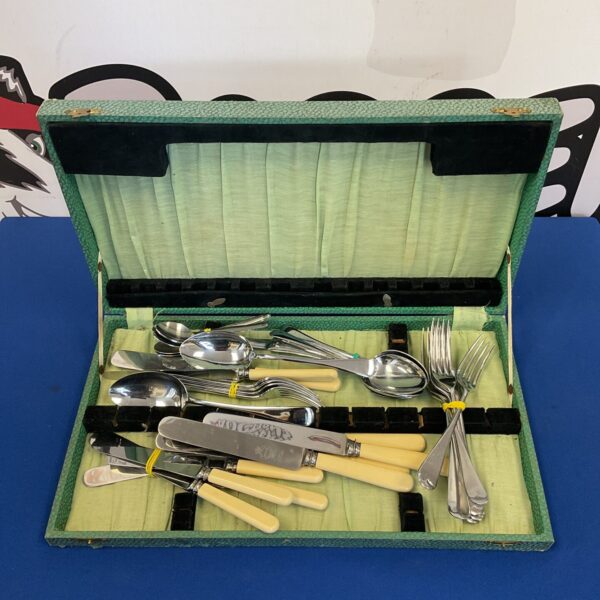 Vintage Firth stainless steel cutlery set with bone handles.