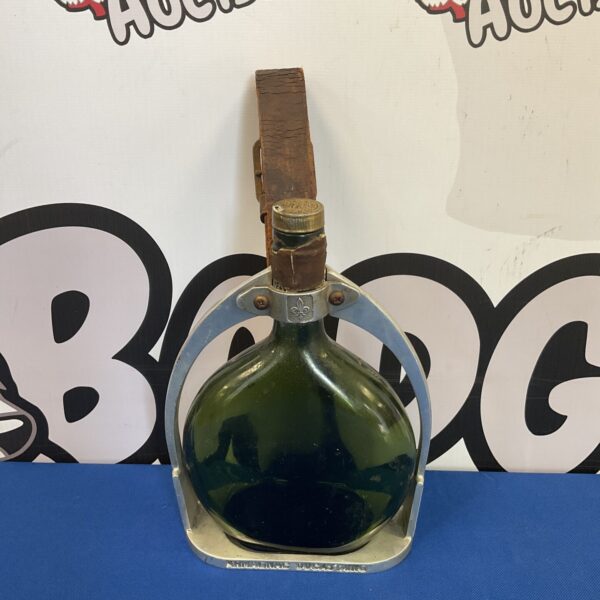 Vintage Armagnac Ducastaing stirrup flask, a unique collectible liquor container.