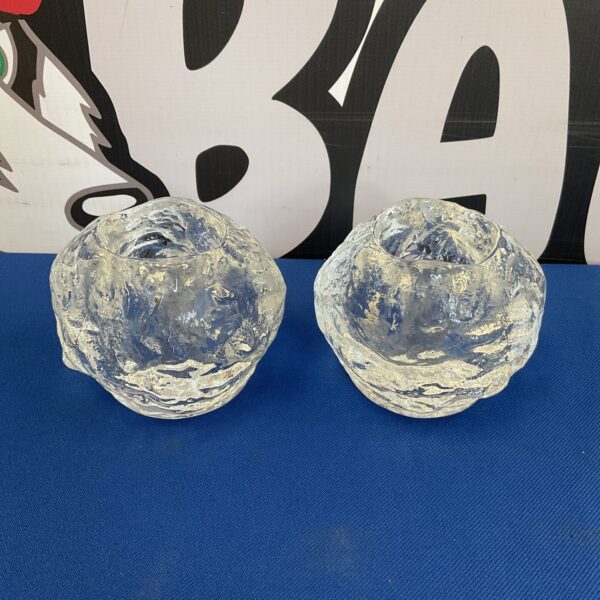 Pair of clear glass Kosta Boda Snowball votive candle holders.